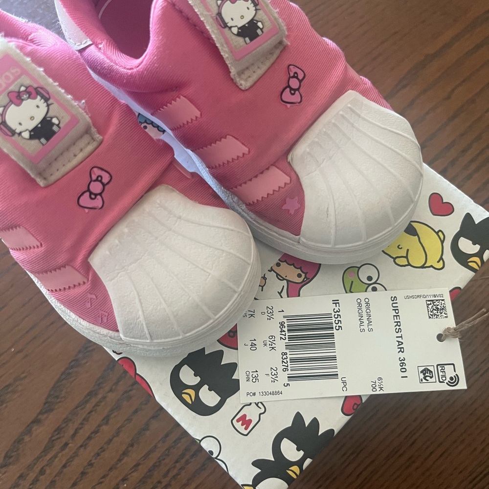 Used condition - our love and adored hello kitty pink adidas 360 size 7